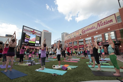 Free yoga on the lawn at Ballpark Village
